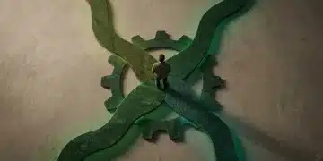 Aerial view of a person standing at the intersection of four interlocking jade pathways, subtly glowing with green light, representing interconnected systems.
